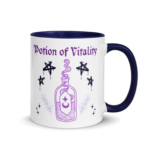 11 oz. white ceramic coffee/tea mug with solid navy blue handle, rim, and inside. Image Design:  purple minimalist potion bottle with a label, moon and star on label, surrounded by graffiti pentacle stars. Image phrase: Potion of Vitality. Right hand side view. Halloween, spooky season.