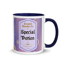 Load image into Gallery viewer, 11 oz. white ceramic coffee/tea mug with solid navy blue handle, rim, and inside. Image Design: potion label that says &#39;Special Potion&#39; with brand name above &#39;Dreaded Banshee Co., established 1690.&#39; Purple-bluish background color with motif of suns, crescent moons, stars, constellations. Image phrase: Special Potion. Right hand side view. Halloween, spooky season.
