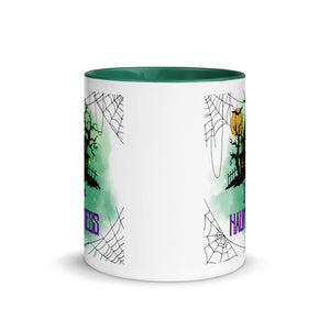 11 oz. white ceramic coffee/tea mug with solid dark green handle, rim, and inside. Image Design: a silhouette of a haunted house, with a moon behind it, and cosmic green cloud behind image. Spider webs in each corners of image. Image phrase: I'm a Haunt Mess. Center front view. Halloween, spooky season.