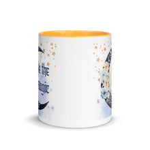 Load image into Gallery viewer, 11 oz. white ceramic coffee/tea mug with solid golden yellow handle, rim, and inside. Image Design: watercolor blue crescent moon, with flowers, daisies, lilies, butterflies. Stars in background, smoky purple background. Image phrase: Be the Magic. Center front view. Halloween, spooky season.
