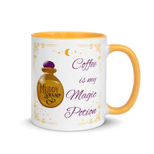 Load image into Gallery viewer, 11 oz. white ceramic coffee/tea mug with solid golden yellow handle, rim, and inside. Image Design: golden potion bottle that says muddy swamp, golden border with gold stars, and moon crescent. Image phrase: Coffee is my Magic Potion. Right hand side view. Halloween, spooky season.
