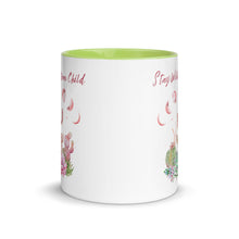 Load image into Gallery viewer, 11 oz. white ceramic coffee/tea mug with solid light green handle, rim, and inside. Image Design: Moon phases, colorful pink and green tinged cacti, with &quot;Stay Wild Moon Child&quot; text. Front center  view.
