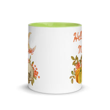 Load image into Gallery viewer, 11 oz. white ceramic coffee/tea mug with solid light green handle, rim, and inside. Image Design:  watercolor pumpkin, and skull, leaves and berries behind. Crescent moon in background. Image phrase: Hello Mabon. Center front view. Halloween, spooky season.
