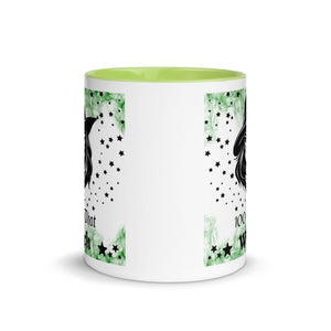 11 oz. white ceramic coffee/tea mug with solid light green handle, rim, and inside. Image Design: Beautiful witch svg, with stars bordering her face and hat, wispy green smoke in background. Image phrase: 100% That Witch. Center front view. Halloween, spooky season.