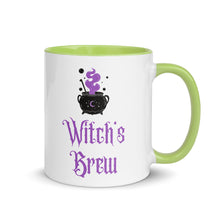 Load image into Gallery viewer, 11 oz. white ceramic coffee/tea mug with solid light green handle, rim, and inside. Image Design: above image phrase, black cauldron with purple smoke, crescent moon on cauldron. Image phrase: Witch&#39;s brew. Right hand side view. Halloween, spooky season.
