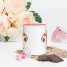 Load image into Gallery viewer, 11 oz. white ceramic coffee/tea mug with solid light pink handle, rim, and inside. Image Design: Female reproductive organ, vagina, uterus, ovaries, with leaves and flowers, moon phases above. Outside center  view.
