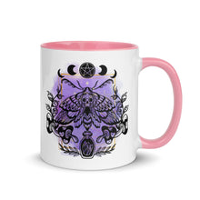 Load image into Gallery viewer, 11 oz. white ceramic coffee/tea mug with solid light pink handle, rim, and inside. Design: Moth with a skull, moon phases, pentacle, mushrooms, and a crystal vial. right hand side view.
