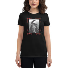 Load image into Gallery viewer, woman wearing/modeling women&#39;s black t-shirt with image of a psychic tarot reader, with tarot cards in hand, crescent moon in background, red crescent moon corner borders
