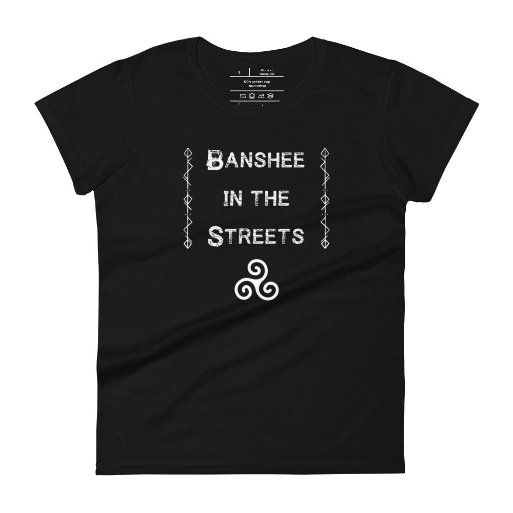 Woman's black t-shirt with image phrase: Banshee in the Streets, tribal symbols on both sides. Triskele at the bottom under phrase. Front view. Front view. Halloween, spooky season.