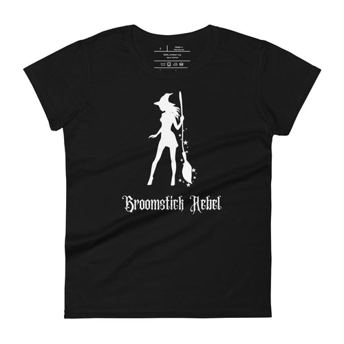 Woman's black t-shirt with image phrase: Broomstick rebel, with image of witch silhouette holding a broom, surrounded by star. Front view. Halloween, spooky season.