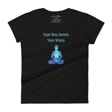 Load image into Gallery viewer, women&#39;s black t-shirt with image phrase: &quot;Your mind shapes your world.&quot; With a green blue watercolor image graphic of a person&#39;s silhouette, in pose of meditation. Front view.
