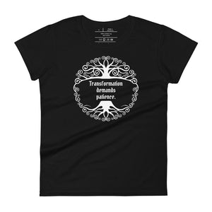 women's black t-shirt, with image phrase: "Transformation demands patience." Front view.