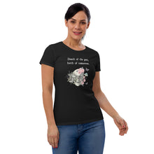 Load image into Gallery viewer, woman modeling/wearing women&#39;s black t-shirt with image design of a skull with plants, mushrooms, roses, and flowers growing out of it, with white butterflies, and image phrase &quot;Death of the Past, Birth of Tomorrow.&quot; Front view.
