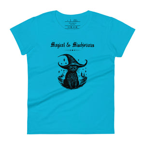 Woman's light blue t-shirt with image phrase: Magical & Mischievous, with image of black cat wearing a black hat underneath. Front view. Halloween, spooky season.