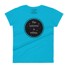 Load image into Gallery viewer, women&#39;s caribbean blue t-shirt, with image phrase &quot;The universe is within,&quot; enclosed in a black circle and stars.
