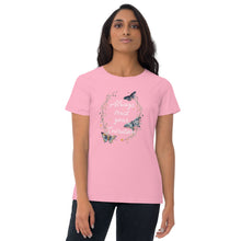 Load image into Gallery viewer, woman modeling/wearing women&#39;s light pink t-shirt. Image Design: Text &quot;Always trust your Intuition,&quot; with plant/vine border, watercolor style moths, stars
