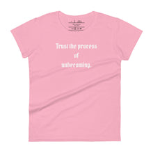 Load image into Gallery viewer, women&#39;s charity pink t-shirt, with image phrase: &quot;Trust the process of unbecoming&quot; Front view.
