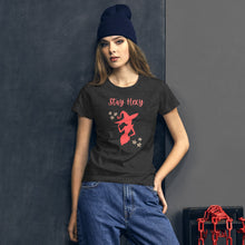 Load image into Gallery viewer, Woman modeling/wearing woman&#39;s dark heather grey t-shirt with image phrase: Stay Hexy (play on words for Stay Sexy), red silhouette of pretty witch form, pentacle stars on both side. Front view. Halloween, spooky season.
