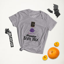 Load image into Gallery viewer, Woman&#39;s light grey t-shirt with image phrase: Practice safe Hex (play on words for &#39;Practice safe sex.&#39; Above phrase is a spell book, a cauldron, a wand. Front view. Halloween, spooky season.
