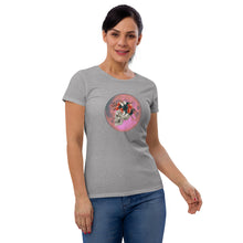 Load image into Gallery viewer, woman modeling/wearing women&#39;s heather grey t-shirt, with image design: side profile of a skull wearing a crown/hat of black roses, red poppies, thorny vines, and white butterflies, with a pink-red moon behind it. Front View.
