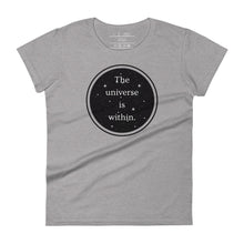 Load image into Gallery viewer, women&#39;s heather grey t-shirt, with image phrase &quot;The universe is within,&quot; enclosed in a black circle and stars.
