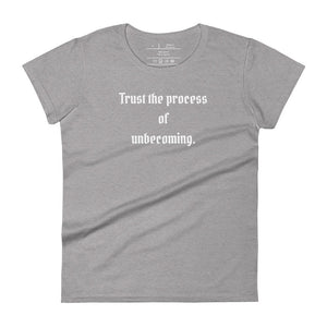 women's heather grey t-shirt, with image phrase: "Trust the process of unbecoming" Front view.