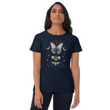 Load image into Gallery viewer, woman modeling/ wearing women&#39;s navy blue t-shirt. Image Design: boho chic style teal blue and light yellow illustrated butterfly, moth, and beetle with celestial elements, stars, moon crescents.
