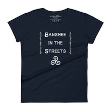 Load image into Gallery viewer, Woman&#39;s navy blue t-shirt with image phrase: Banshee in the Streets, tribal symbols on both sides. Triskele at the bottom under phrase. Front view. Front view. Halloween, spooky season.
