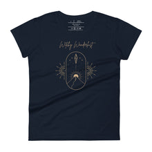 Load image into Gallery viewer, Woman&#39;s navy blue t-shirt with image phrase: Witchy Wanderlust. Image under phrase is a minimalist hill with a sun behind, stars in the sky, and crystal suspended above the hill. Bordered with crescent moon on either side. Front view. Halloween, spooky season.
