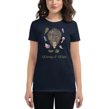 Load image into Gallery viewer, Woman modeling/wearing woman&#39;s navy blue t-shirt with image phrase: Witchy &amp; Wild, with image of woman&#39;s head with antlers, and stars in her hair. Circling her head are crystals, frog, snail, fern leaf, bunch of flowers, mushroom. Front view. Halloween, spooky season.
