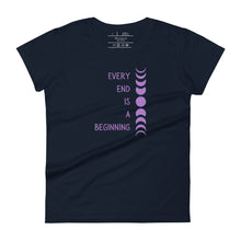 Load image into Gallery viewer, women&#39;s navy blue t-shirt with image phrase &quot;every end is a beginning,&quot; with image design of moon phases, from new moon, to full moon, to new moon. Front view.
