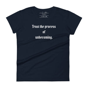 women's navy blue t-shirt, with image phrase: "Trust the process of unbecoming" Front view.