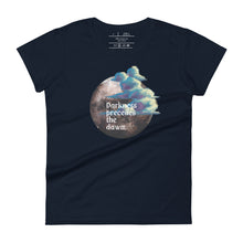 Load image into Gallery viewer, women&#39;s navy blue t-shirt with image design of a dark moon, with a colorful dawn cloud in front, with image phrase: &quot;Darkness precedes the Dawn.&quot; Front View.
