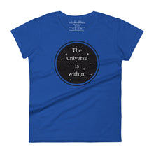 Load image into Gallery viewer, women&#39;s royal blue t-shirt, with image phrase &quot;The universe is within,&quot; enclosed in a black circle and stars.
