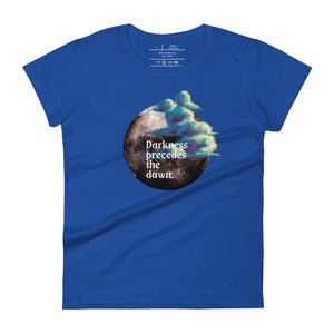 women's royal blue t-shirt with image design of a dark moon, with a colorful dawn cloud in front, with image phrase: "Darkness precedes the Dawn." Front View.