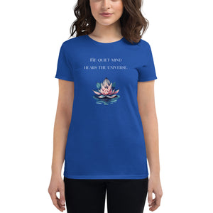 woman modeling/wearing women's royal blue t-shirt, with image phrase: "The quiet mind hears the Universe." Image of watercolor pink and blue lotus flower floating on water.