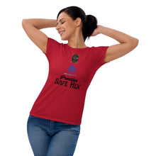 Load image into Gallery viewer, Woman modeling/wearing woman&#39;s red t-shirt with image phrase: Practice safe Hex (play on words for &#39;Practice safe sex.&#39; Above phrase is a spell book, a cauldron, a wand. Front view. Halloween, spooky season.
