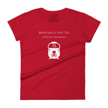 Load image into Gallery viewer, Woman&#39;s red t-shirt with image phrase: Brew spells, not tea (pinche chismosa). Underneath words is an image of a cauldron decorated with stars and skull with crossbones. Front view. Halloween, spooky season.
