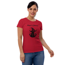 Load image into Gallery viewer, Woman modeling/wearing woman&#39;s red t-shirt with image phrase: Magical &amp; Mischievous, with image of black cat wearing a black hat underneath. Front view. Halloween, spooky season.
