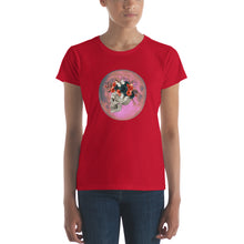 Load image into Gallery viewer, woman modeling/wearing women&#39;s true red t-shirt, with image design: side profile of a skull wearing a crown/hat of black roses, red poppies, thorny vines, and white butterflies, with a pink-red moon behind it. Front View.
