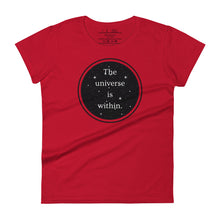 Load image into Gallery viewer, women&#39;s true red t-shirt, with image phrase &quot;The universe is within,&quot; enclosed in a black circle and stars.
