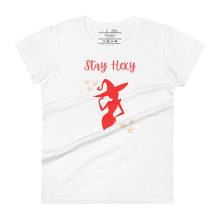 Load image into Gallery viewer, Woman&#39;s white t-shirt with image phrase: Stay Hexy (play on words for Stay Sexy), red silhouette of pretty witch form, pentacle stars on both side. Front view. Halloween, spooky season.
