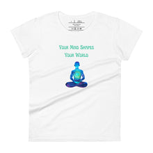 Load image into Gallery viewer, women&#39;s white t-shirt with image phrase: &quot;Your mind shapes your world.&quot; With a green blue watercolor image graphic of a person&#39;s silhouette, in pose of meditation. Front view.
