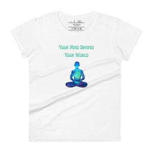 women's white t-shirt with image phrase: "Your mind shapes your world." With a green blue watercolor image graphic of a person's silhouette, in pose of meditation. Front view.