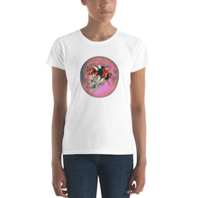 Load image into Gallery viewer, woman modeling/wearing women&#39;s white t-shirt, with image design: side profile of a skull wearing a crown/hat of black roses, red poppies, thorny vines, and white butterflies, with a pink-red moon behind it. Front View.
